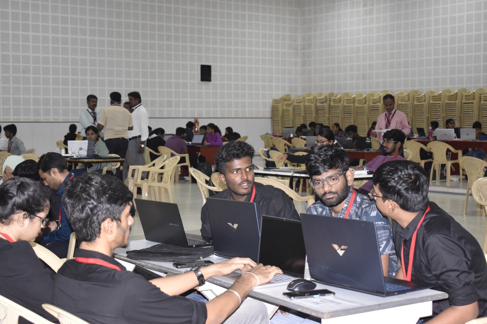 Team coding at a hackathon